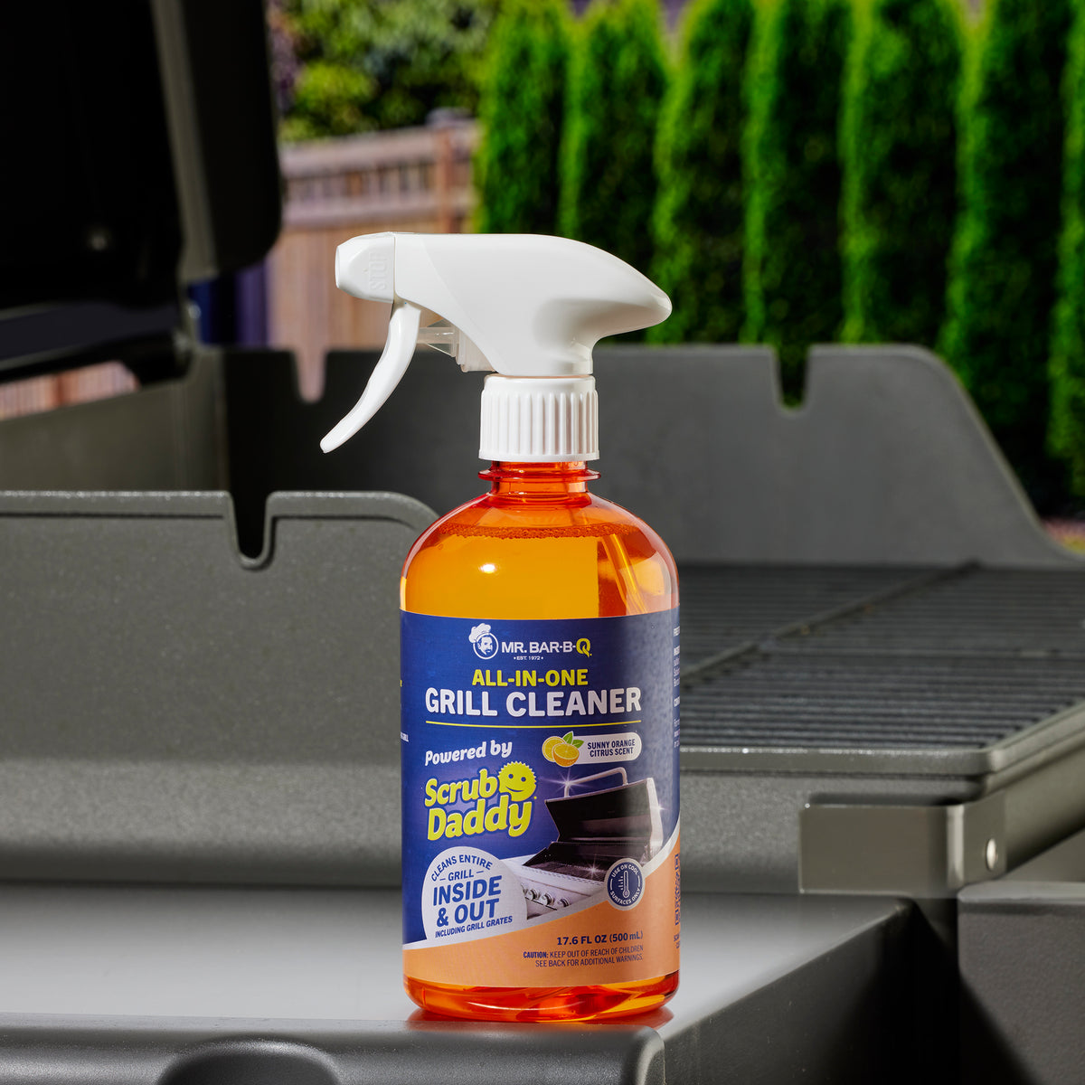 Mr. Bar-B-Q All-In-One Grill Cleaner bottle powered by Scrub Daddy with sunny orange citrus scent, shown in a 17.6 fl oz spray bottle, designed for cleaning grills inside and out, including grates.